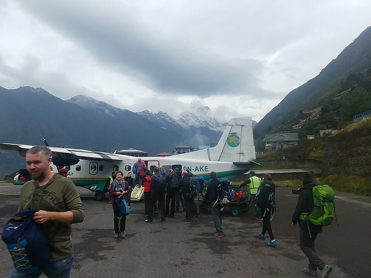 Trekkers unloading gear at Lukla airstrip